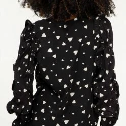 Essentiel Antwerp Zammoth Ruffed Sleeve Top in Black - women -Outlets Shop 3354719bc2bd4ce88ff86ca92d3b5ccc 1080x